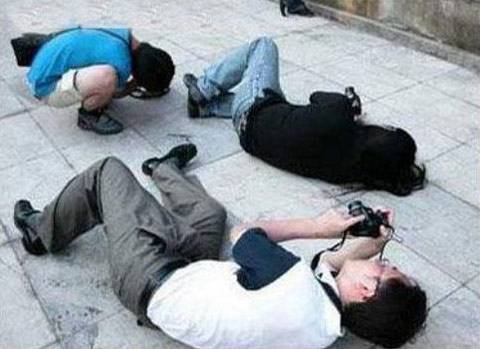 摄影师爆笑的拍照姿势