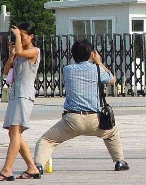 摄影师爆笑的拍照姿势