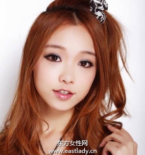 利用发饰垫高法重新打造张力美发