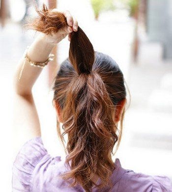 2011瘦脸的发型-散发浪漫气息的花苞头