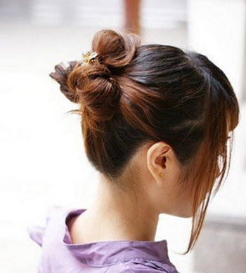 2011瘦脸的发型-散发浪漫气息的花苞头