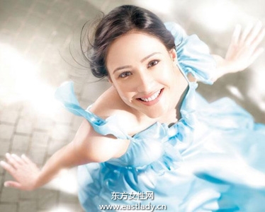 使用遮阳伞也别忘了用防晒霜