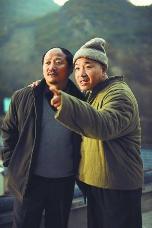 谢广坤的扮演者唐鉴军个人资料 唐鉴军老婆王小华照片