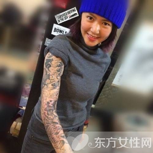 谭维维手臂霸气纹身引争议 揭谭维维多处纹身来历