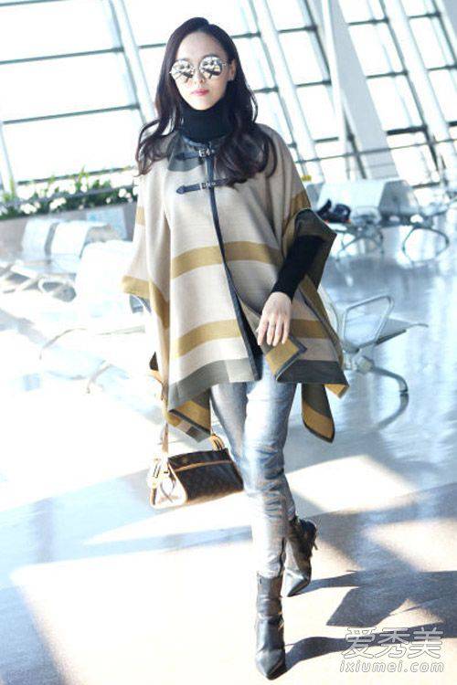 女星机场时尚街拍 刘诗诗粉红大衣亮相