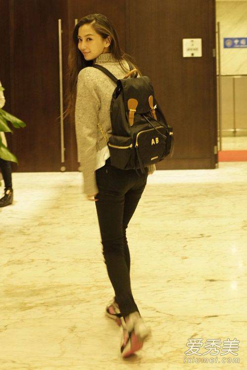 女星机场时尚街拍 刘诗诗粉红大衣亮相